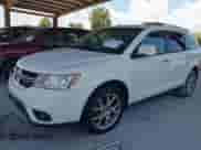 2013 Dodge Journey Crew z VIN 3C4PDCDG7DT558934, wystawiony jako IAAI lot #42869150 z przebiegiem 234 427 mil mil oraz . Historia ofert i sprzedaży dostępna na DreamBid. Obrazek 2.