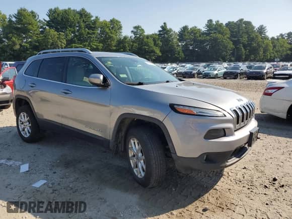 2016 Jeep Cherokee Latitude with VIN 1C4PJMCB2GW100138, listed as a Copart auction lot 64548445 with 211,628 mi miles and Salvage title. Bid and sale history available at DreamBid. Image 4.