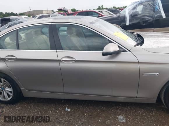 2014 BMW 5 Series 528i z VIN WBA5A5C50ED503595, wystawiony jako IAAI lot #42641762 z przebiegiem 100 608 mil mil oraz . Historia ofert i sprzedaży dostępna na DreamBid. Obrazek 14.