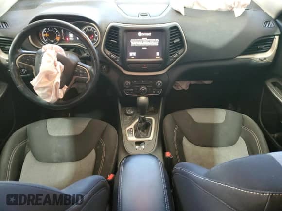 2014 Jeep Cherokee Latitude with VIN 1C4PJMCB2EW297843, listed as a Copart auction lot 85495155 with 175,788 mi miles and Salvage title. Bid and sale history available at DreamBid. Image 8.