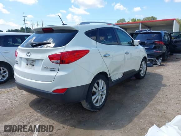 2012 Hyundai Tucson GLS with VIN KM8JU3AC1CU518372, listed as a IAAI auction lot 43323058 with 130,824 mi miles and . Bid and sale history available at DreamBid. Image 4.