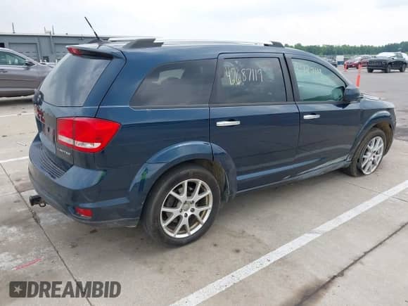 2014 Dodge Journey Limited with VIN 3C4PDCDG0ET156092, listed as a IAAI auction lot 42687119 with 174,036 mi miles and . Bid and sale history available at DreamBid. Image 4.