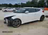 2017 Hyundai Veloster Turbo с VIN KMHTC6AE9HU310410, выставлен на аукционе Copart как лот 70563525 с пробегом 75 826 миль миль и Списание • Salvage title. История ставок и продаж доступна на DreamBid. Изображение 1.