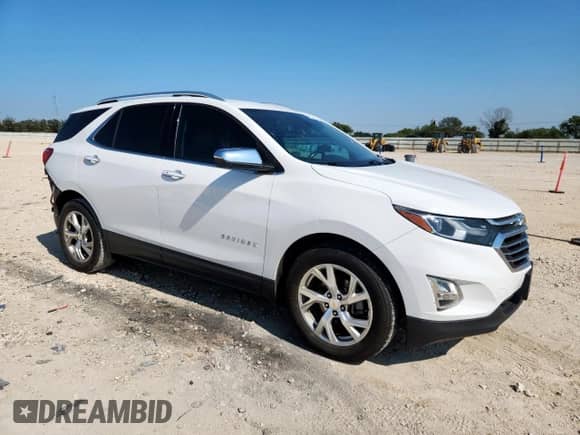 2020 Chevrolet Equinox Premier с VIN 2GNAXNEV8L6203318, выставлен на аукционе Copart как лот 70734555 с пробегом 69 262 миль миль и Списание • Salvage title. История ставок и продаж доступна на DreamBid. Изображение 4.