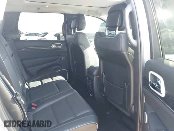 2020 Jeep Grand Cherokee Summit with VIN 1C4RJFJG2LC173184, listed as a IAAI auction lot 41343182 with 70,192 mi miles and . Bid and sale history available at DreamBid. Image 8.