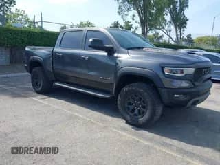 2022 Ram 1500 TRX with VIN 1C6SRFU91NN392885, listed as a IAAI auction lot 42482710 with 13,090 mi miles and . Bid and sale history available at DreamBid. Image 1.