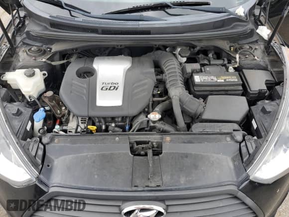 2014 Hyundai Veloster Turbo R-Spec с VIN KMHTC6AE9EU209637, выставлен на аукционе Copart как лот 67860545 с пробегом 112 479 миль миль и Списание • Salvage title. История ставок и продаж доступна на DreamBid. Изображение 11.