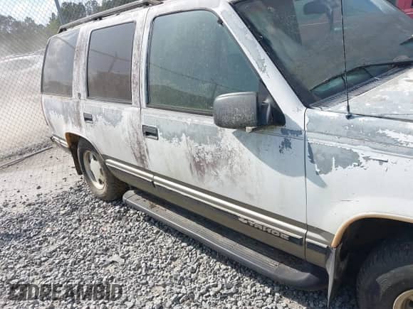 1999 Chevrolet Tahoe with VIN 1GNEC13R3XJ539270, listed as a IAAI auction lot 41972014 with 264,619 mi miles and . Bid and sale history available at DreamBid. Image 13.