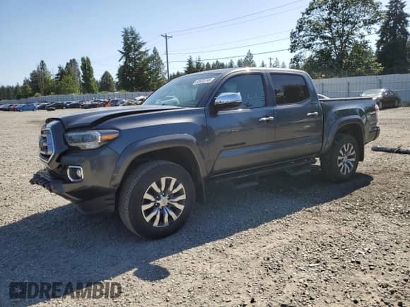 2022 Toyota Tacoma Limited with VIN 3TMGZ5ANXNM515023, listed as a Copart auction lot 58633745 with 23,668 mi miles and Salvage title. Bid and sale history available at DreamBid. Image 1.