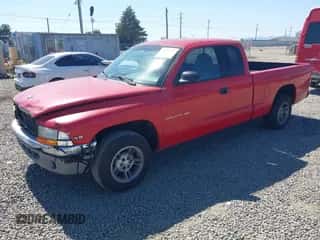 1998 Dodge Dakota SLT z VIN 1B7GL22Y9WS515290, wystawiony jako IAAI lot #42817601 z przebiegiem 169 099 mil mil oraz . Historia ofert i sprzedaży dostępna na DreamBid. Obrazek 2.