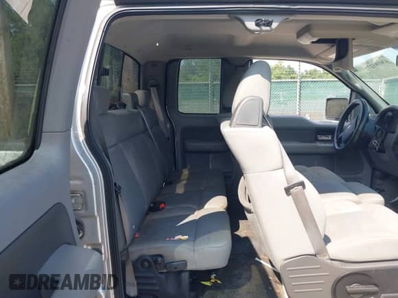 2007 Ford F-150 STX with VIN 1FTRX12WX7FA06762, listed as a IAAI auction lot 43010327 with 156,760 mi miles and . Bid and sale history available at DreamBid. Image 8.