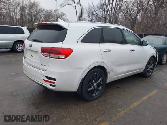 2016 Kia Sorento SXL z VIN 5XYPKDA59GG116070, wystawiony jako IAAI lot #41503521 z przebiegiem 108 516 mil mil oraz . Historia ofert i sprzedaży dostępna na DreamBid. Obrazek 4.