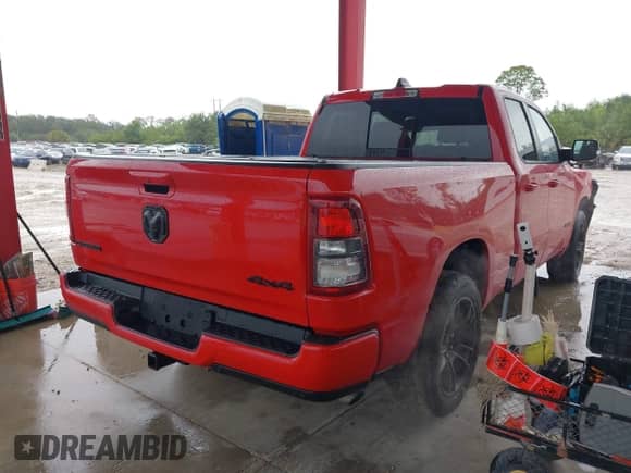 2022 Ram 1500 Big Horn with VIN 1C6RRFBG7NN220702, listed as a IAAI auction lot 42244874 with 39,799 mi miles and . Bid and sale history available at DreamBid. Image 4.