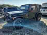 1997 Jeep Wrangler Sport with VIN 1J4FY19S0VP430844, listed as a Copart auction lot 65827275 with 91,868 mi miles and Salvage title. Bid and sale history available at DreamBid. Image 1.