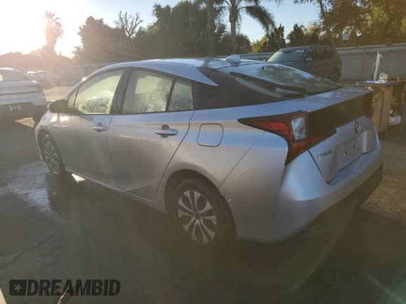 2019 Toyota Prius LE с VIN JTDKARFU0K3085458, выставлен на аукционе Copart как лот 83875355 с пробегом 99 999 миль миль и Чистый • Clean title. История ставок и продаж доступна на DreamBid. Изображение 2.