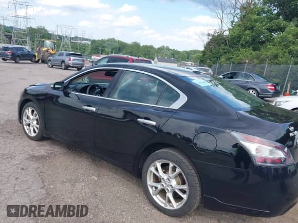 2014 Nissan Maxima SV z VIN 1N4AA5AP4EC477861, wystawiony jako IAAI lot #42542497 z przebiegiem 103 294 mil mil oraz . Historia ofert i sprzedaży dostępna na DreamBid. Obrazek 3.