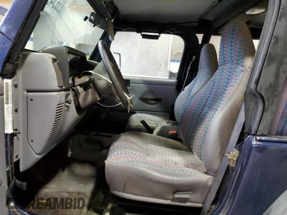 1997 Jeep Wrangler Sport with VIN 1J4FY19S2VP451677, listed as a Copart auction lot 80634555 with 137,374 mi miles and Clean title. Bid and sale history available at DreamBid. Image 7.