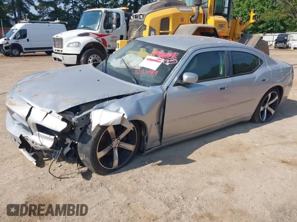 2010 Dodge Charger SXT with VIN 2B3CA3CV7AH126938, listed as a IAAI auction lot 42838919 with 188,868 mi miles and . Bid and sale history available at DreamBid. Image 2.