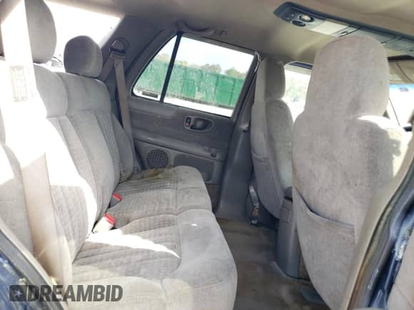 1999 Chevrolet Blazer LS z VIN 1GNCS13W3X2174681, wystawiony jako Copart lot #51832365 z przebiegiem 209 536 mil mil oraz Szkoda całkowita • Salvage title. Historia ofert i sprzedaży dostępna na DreamBid. Obrazek 11.