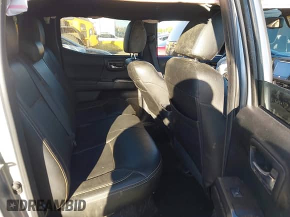 2017 Toyota Tacoma SR5 with VIN 3TMCZ5AN9HM089795, listed as a IAAI auction lot 43390094 with 83,988 mi miles and . Bid and sale history available at DreamBid. Image 8.
