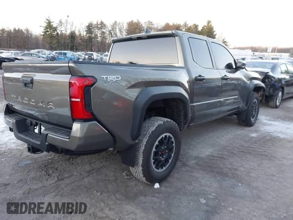 2024 Toyota Tacoma SR5 with VIN 3TMLB5JN9RM046175, listed as a IAAI auction lot 41006597 with 6,139 mi miles and . Bid and sale history available at DreamBid. Image 4.