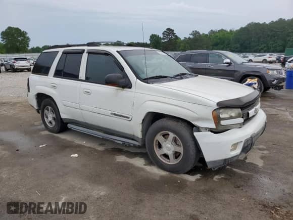2004 Chevrolet TrailBlazer LS with VIN 1GNDT13S542228203, listed as a Copart auction lot 55881835 with 229,854 mi miles and Clean title. Bid and sale history available at DreamBid. Image 4.