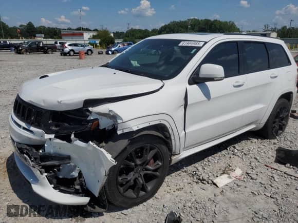2017 Jeep Grand Cherokee SRT z VIN 1C4RJFDJXHC738652, wystawiony jako Copart lot #61984665 z przebiegiem 108 202 mil mil oraz Szkoda całkowita • Salvage title. Historia ofert i sprzedaży dostępna na DreamBid. Obrazek 1.