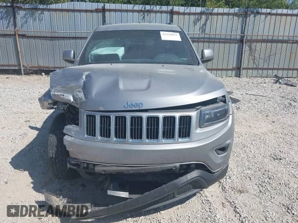 2016 Jeep Grand Cherokee Laredo with VIN 1C4RJFAG6GC400852, listed as a IAAI auction lot 43128932 with 219,285 mi miles and . Bid and sale history available at DreamBid. Image 13.