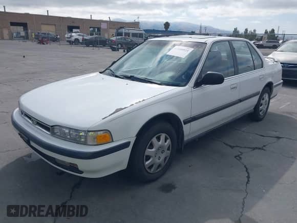 1990 Honda Accord LX with VIN JHMCB7652LC067333, listed as a IAAI auction lot 42580921 with 119,733 mi miles and . Bid and sale history available at DreamBid. Image 6.