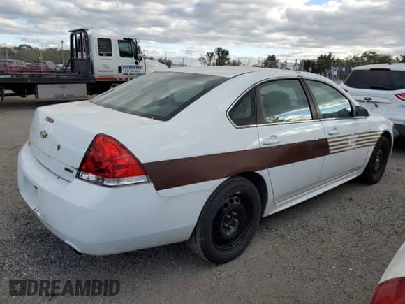 2015 Chevrolet Impala Police Police с VIN 2G1WD5E34F1160497, выставлен на аукционе Copart как лот 75945334 с пробегом 59 793 миль миль и На запчасти • Non repairable. История ставок и продаж доступна на DreamBid. Изображение 3.
