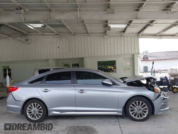 2015 Hyundai Sonata Limited z VIN 5NPE34AF0FH038895, wystawiony jako IAAI lot #43193189 z przebiegiem 103 857 mil mil oraz . Historia ofert i sprzedaży dostępna na DreamBid. Obrazek 14.