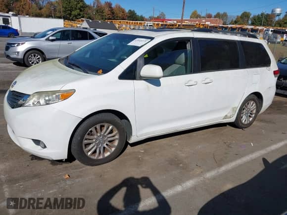 2011 Toyota Sienna XLE with VIN 5TDYK3DC7BS120249, listed as a IAAI auction lot 43545371 with 175,936 mi miles and . Bid and sale history available at DreamBid. Image 17.