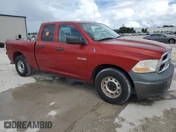 2009 Dodge 1500 ST with VIN 1D3HB18P39S732412, listed as a Copart auction lot 70824854 with 119,329 mi miles and Salvage title. Bid and sale history available at DreamBid. Image 4.