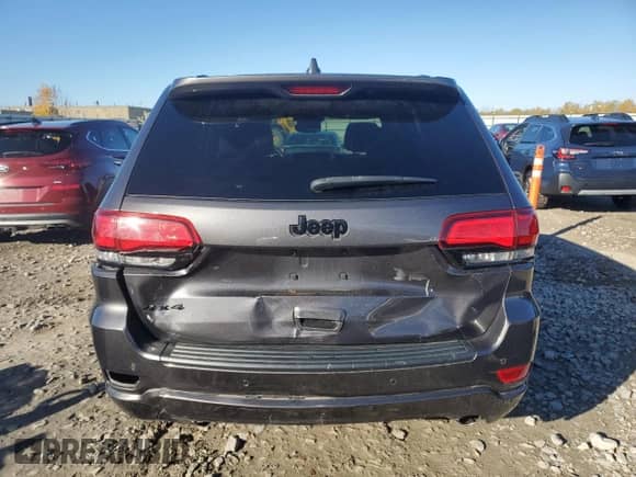 2019 Jeep Grand Cherokee Altitude with VIN 1C4RJFAGXKC547183, listed as a Copart auction lot 82522055 with 91,228 mi miles and Salvage title. Bid and sale history available at DreamBid. Image 6.