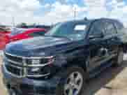 2019 Chevrolet Tahoe LT with VIN 1GNSCBKC5KR327874, listed as a IAAI auction lot 42565643 with 79,213 mi miles and . Bid and sale history available at DreamBid. Image 2.