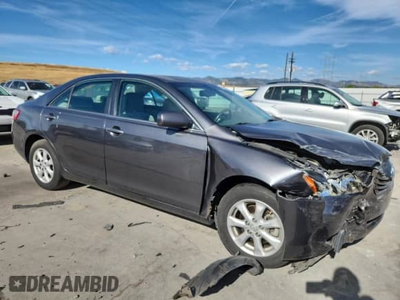 2007 Toyota Camry LE with VIN 4T1BK46K97U039137, listed as a Copart auction lot 71780925 with 213,494 mi miles and Salvage title. Bid and sale history available at DreamBid. Image 4.