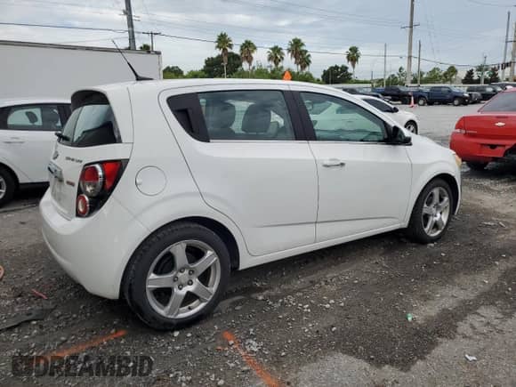 2013 Chevrolet Sonic LTZ with VIN 1G1JE6SB5D4203691, listed as a Copart auction lot 65452745 with 60,070 mi miles and Salvage title. Bid and sale history available at DreamBid. Image 3.