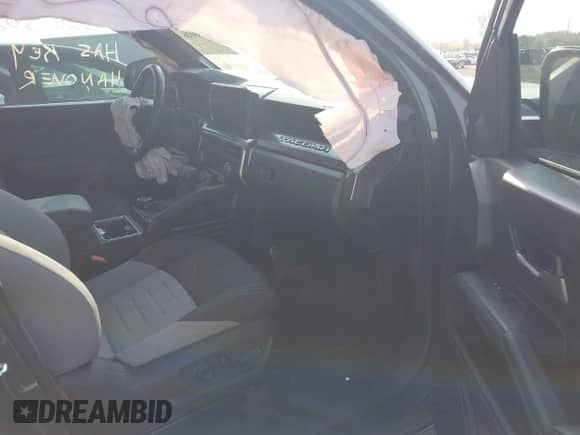 2024 Toyota Tacoma SR5 with VIN 3TYLB5JN7RT001210, listed as a IAAI auction lot 43255026 with 16,983 mi miles and . Bid and sale history available at DreamBid. Image 5.