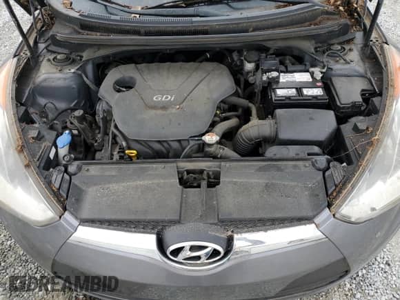 2014 Hyundai Veloster z VIN KMHTC6AD8EU196161, wystawiony jako Copart lot #82244385 z przebiegiem 146 717 mil mil oraz Czysty tytuł • Clean title. Historia ofert i sprzedaży dostępna na DreamBid. Obrazek 11.