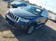 2013 Jeep Grand Cherokee Limited z VIN 1C4RJFBG4DC648995, wystawiony jako IAAI lot #43338050 z przebiegiem 138 551 mil mil oraz . Historia ofert i sprzedaży dostępna na DreamBid. Obrazek 2.