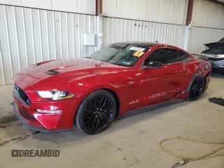 2021 Ford Mustang GT с VIN 1FA6P8CF4M5127742, выставлен на аукционе Copart как лот 70626635 с пробегом 27 810 миль миль и Списание • Salvage title. История ставок и продаж доступна на DreamBid. Изображение 1.