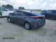 2022 Toyota Prius Limited with VIN JTDKAMFP6N3201845, listed as a IAAI auction lot 43216746 with 82,457 mi miles and . Bid and sale history available at DreamBid. Image 3.