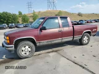 1997 GMC Sierra 1500 с VIN 2GTEK19R4V1503159, выставлен на аукционе Copart как лот 67406555 с пробегом 195 036 миль миль и Списание • Salvage title. История ставок и продаж доступна на DreamBid. Изображение 1.