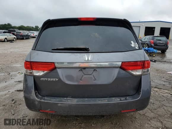 2014 Honda Odyssey LX z VIN 5FNRL5H28EB126388, wystawiony jako Copart lot #70583975 z przebiegiem 148 425 mil mil oraz Szkoda całkowita • Salvage title. Historia ofert i sprzedaży dostępna na DreamBid. Obrazek 6.