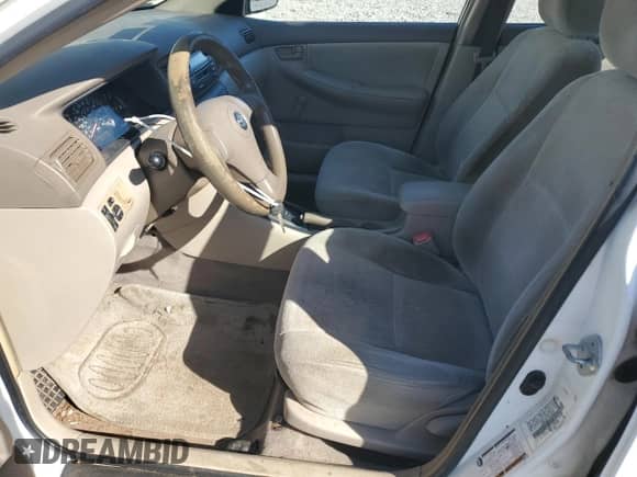 2004 Toyota Corolla CE with VIN JTDBR32E142042261, listed as a Copart auction lot 90053425 with 299,999 mi miles and Clean title. Bid and sale history available at DreamBid. Image 7.