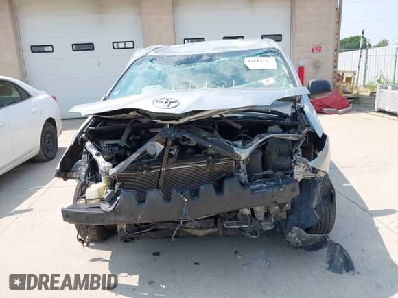 2015 Toyota Sienna L with VIN 5TDZK3DCXFS627611, listed as a IAAI auction lot 42823348 with 298,381 mi miles and . Bid and sale history available at DreamBid. Image 3.