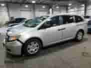 2013 Honda Odyssey LX с VIN 5FNRL5H26DB091882, выставлен на аукционе Copart как лот 80729305 с пробегом 111 324 миль миль и Списание • Salvage title. История ставок и продаж доступна на DreamBid. Изображение 1.