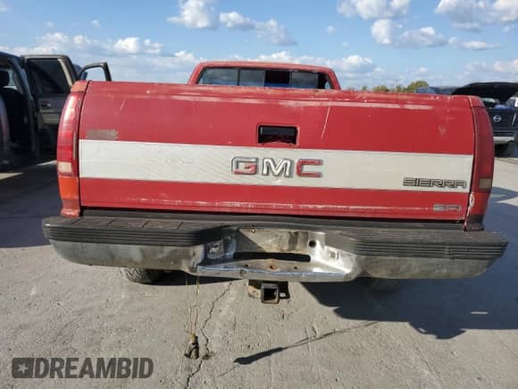 1989 GMC Sierra 1500 z VIN 1GTDC14K5KE501207, wystawiony jako Copart lot #82004945 z przebiegiem 59 412 mil mil oraz Szkoda całkowita • Salvage title. Historia ofert i sprzedaży dostępna na DreamBid. Obrazek 6.