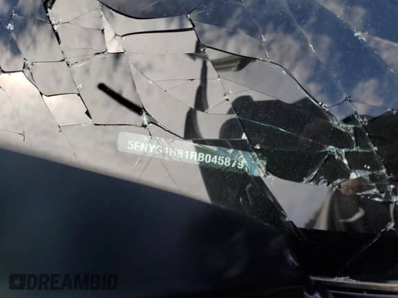 2024 Honda Pilot Elite with VIN 5FNYG1H81RB045879, listed as a Copart auction lot 65841735 with 9,985 mi miles and Salvage title. Bid and sale history available at DreamBid. Image 13.