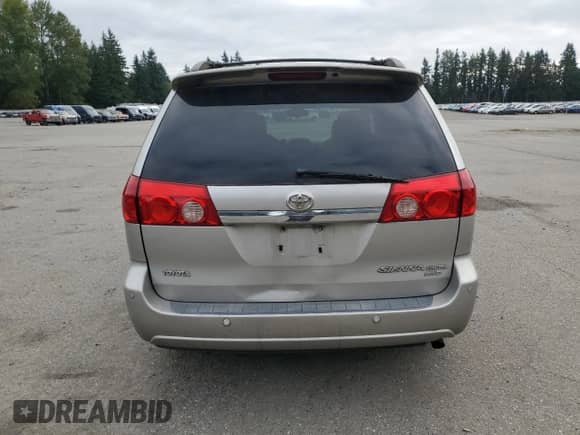 2006 Toyota Sienna XLE z VIN 5TDBA22C06S075554, wystawiony jako Copart lot #69133605 z przebiegiem 188 185 mil mil oraz Szkoda całkowita • Salvage title. Historia ofert i sprzedaży dostępna na DreamBid. Obrazek 6.